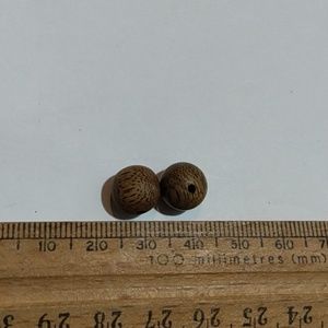 Lot of 2 2.5ct 10 mm sinking grade aquilaria agar wood, oud beads from Vietnam